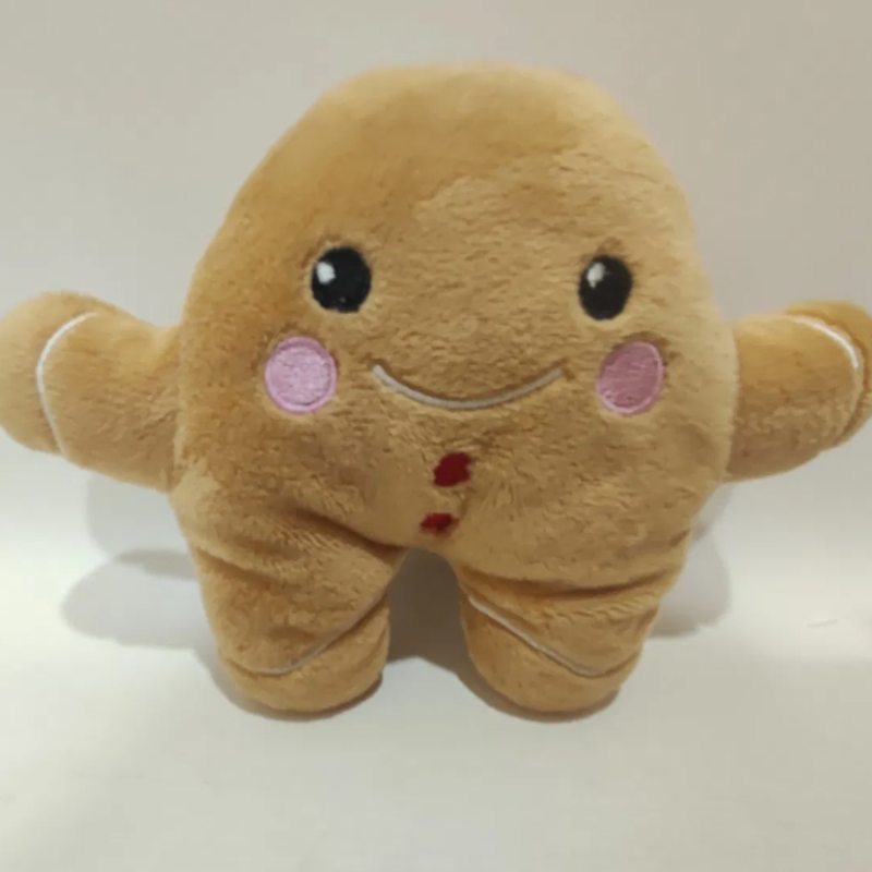 Muñeco de jengibre de peluche navideño